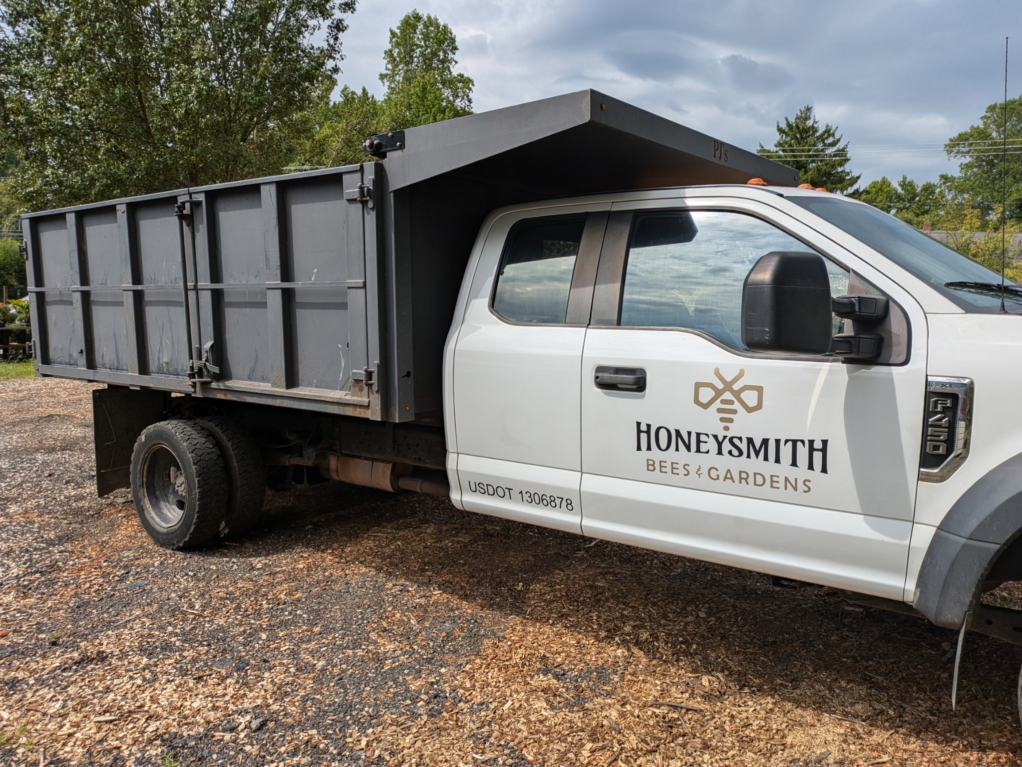 Honeysmith dump truck used for local bulk mulch delivery